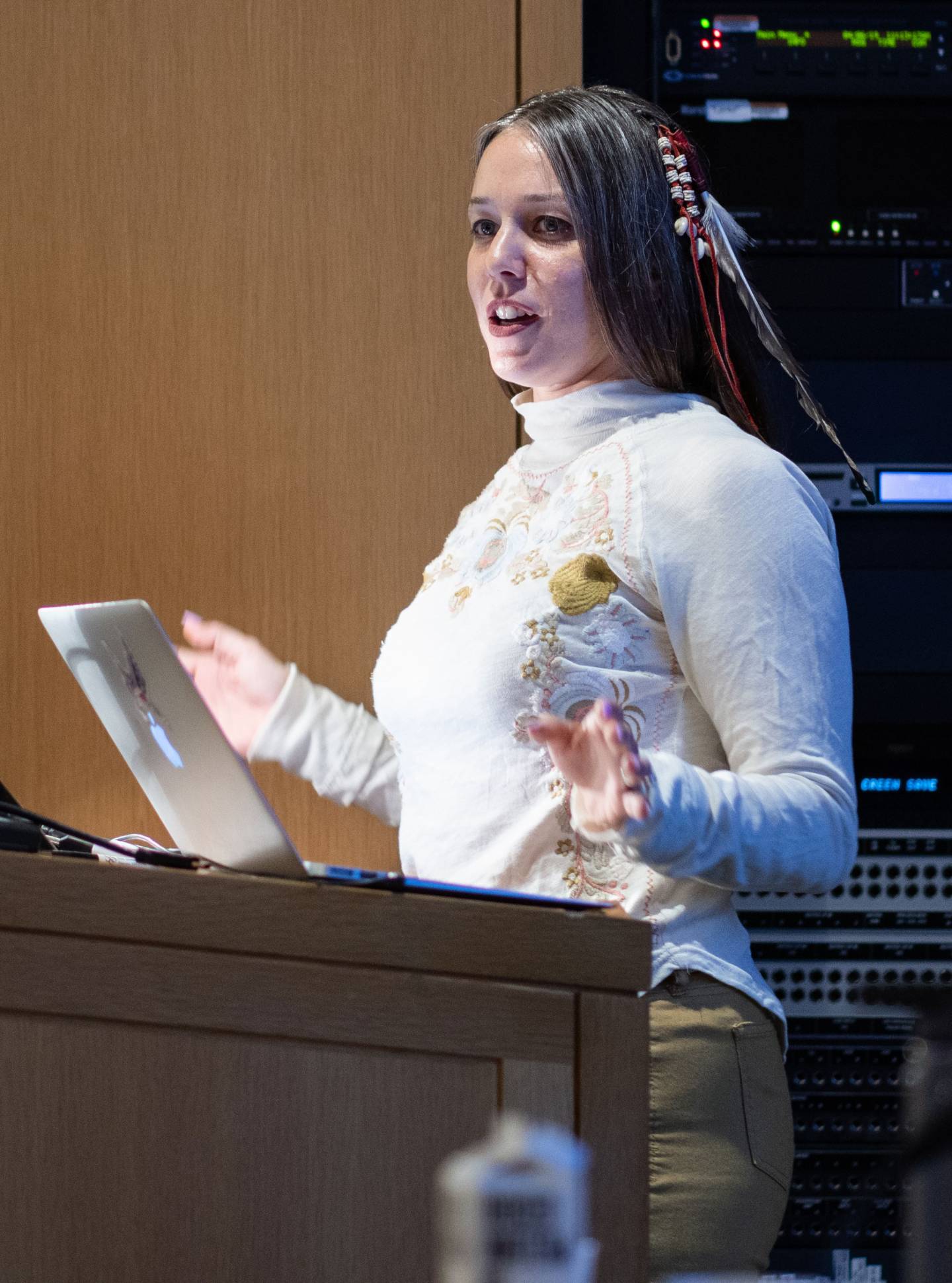 Desiree Kane speaking at podium
