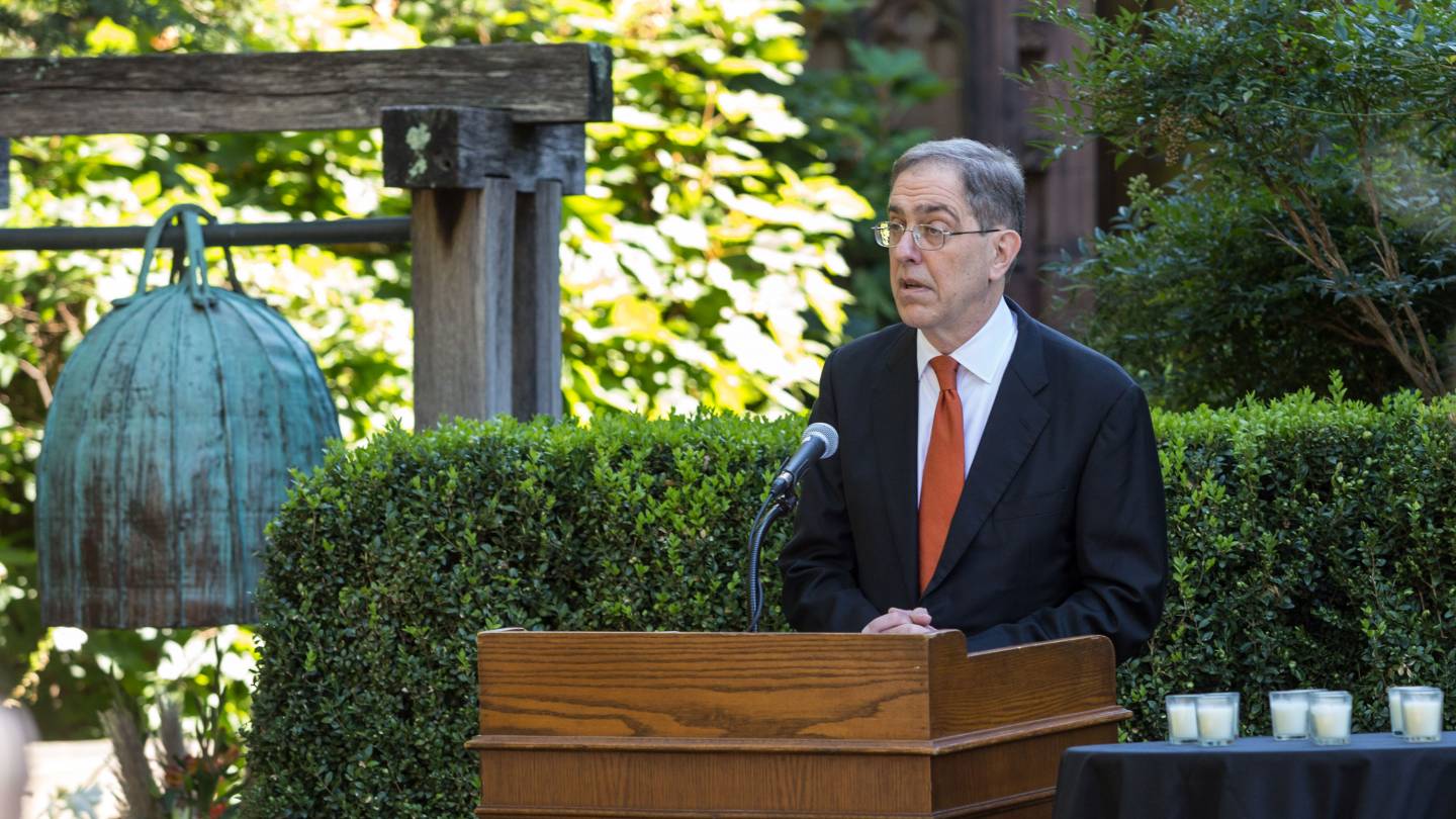 President Christopher L. Eisgruber speaks at a podium