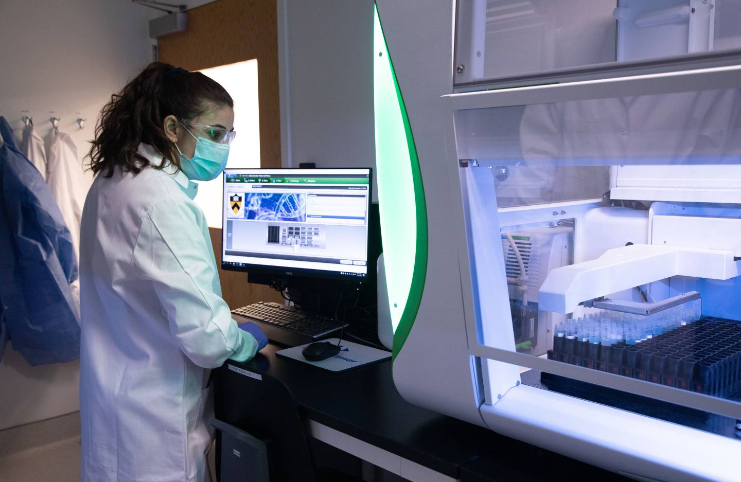 Staff member at the University's COVID testing lab
