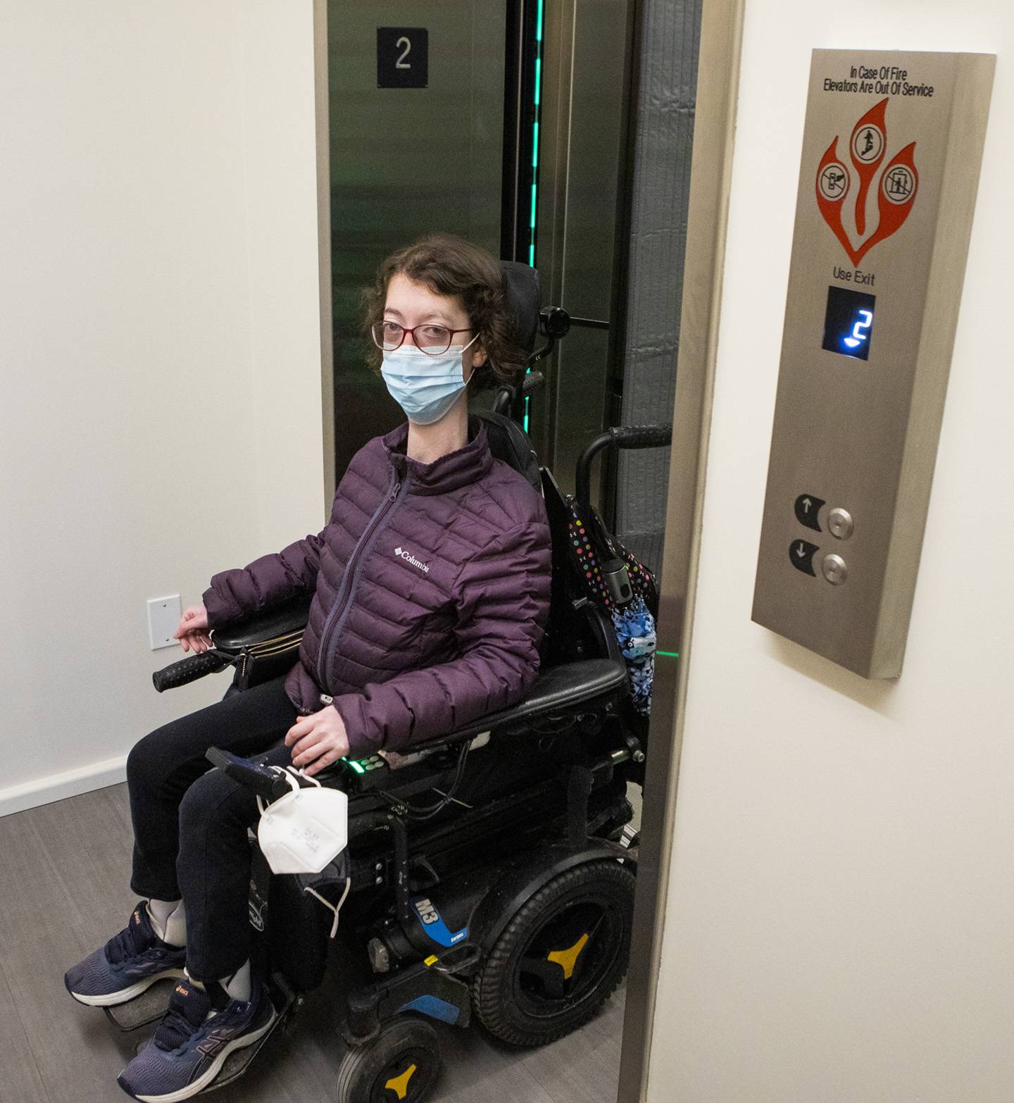 Student uses the new elevator in Nassau Hall.