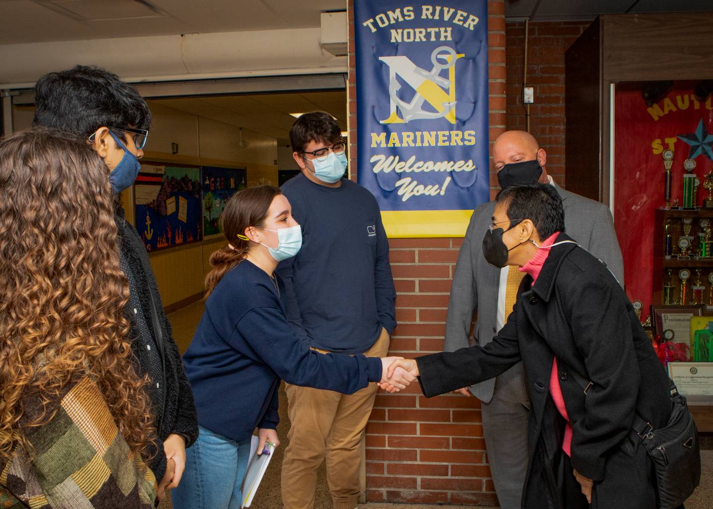 Maria Ressa shakes hands with students at Tom's River