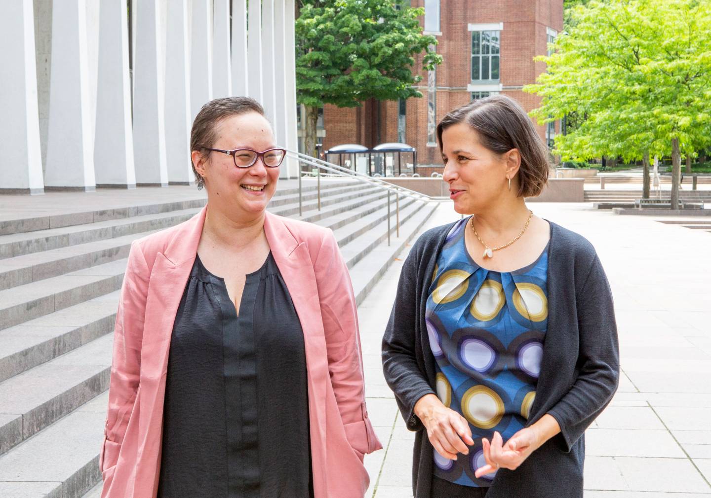 2 women walk and talk