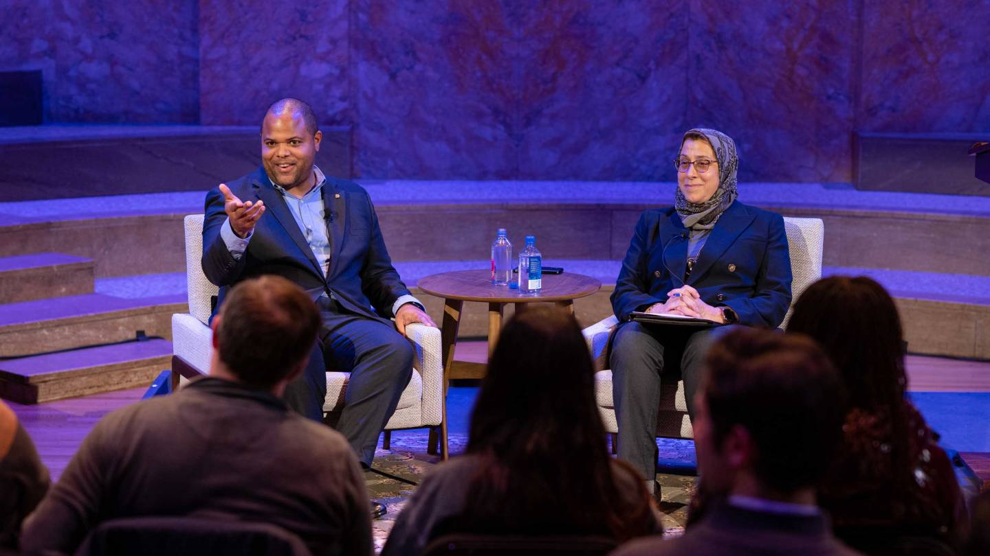 Mayor Eric Johnson gesticulates while answering a question during an event