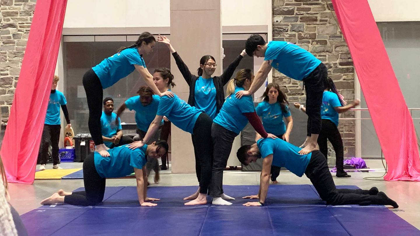 Trenton circus performers make a pyramid