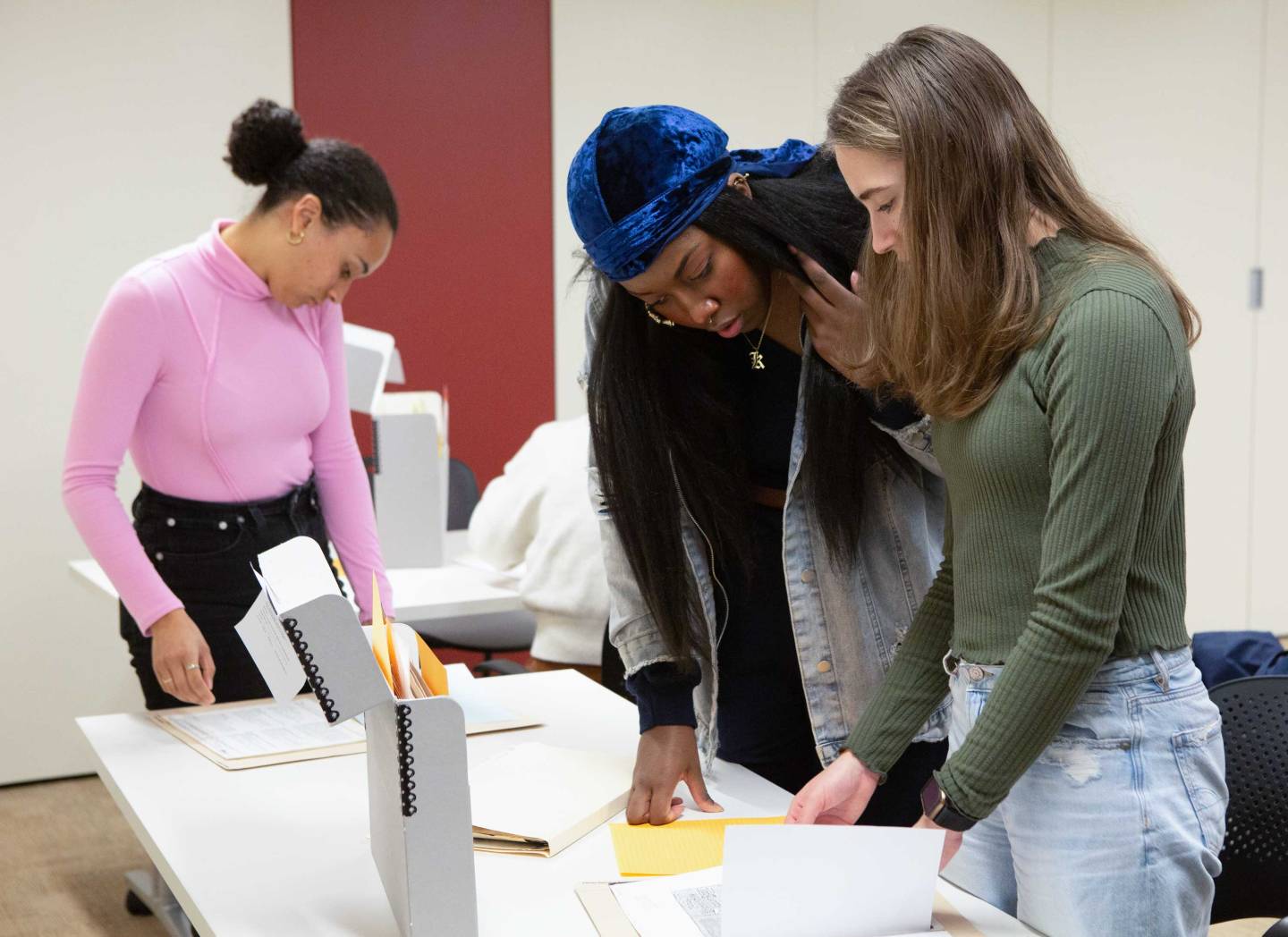 Autumn Womack's students pore over documents
