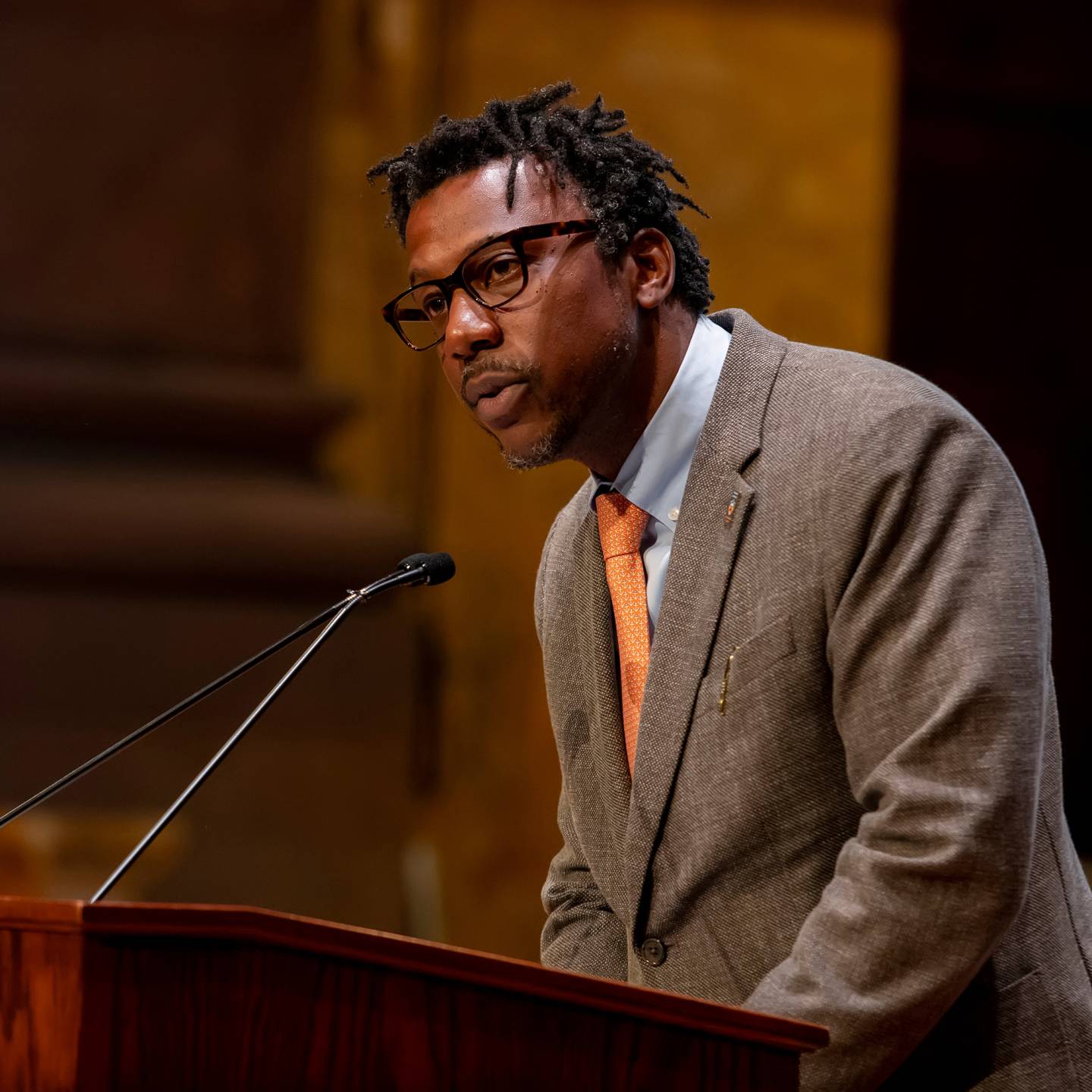 Dean Rodney Priestley at podium