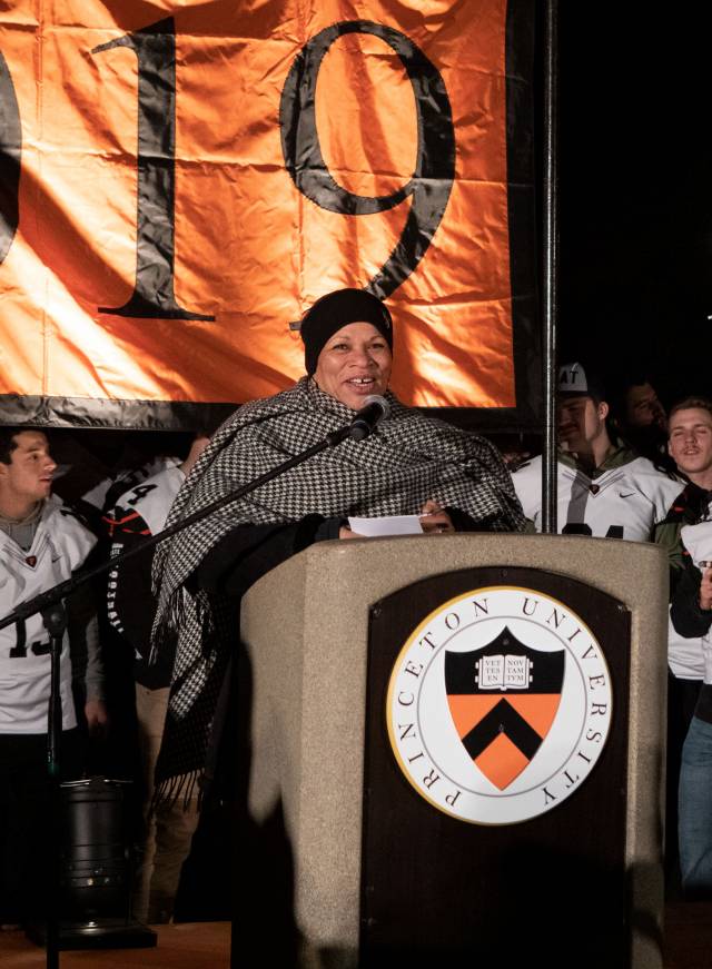 Rochelle Calhoun congratulates the Princeton football team