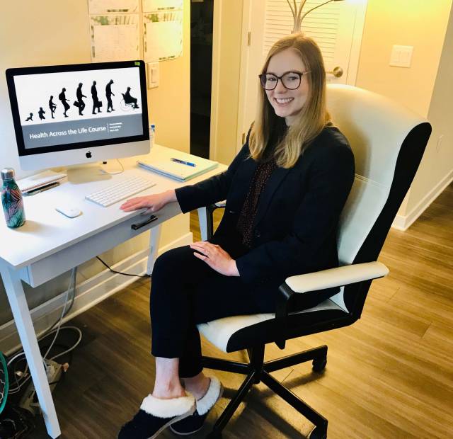 Theresa Andrasfay working at her computer