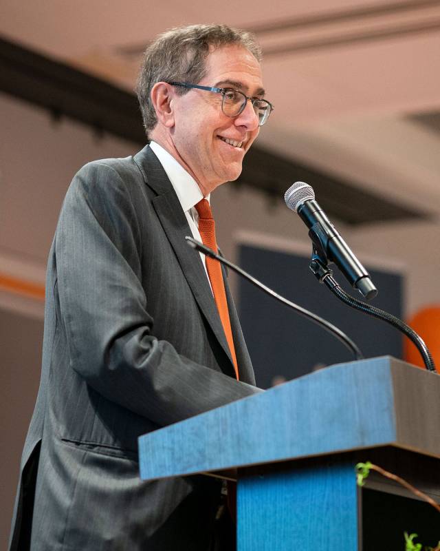 President Christopher L. Eisgruber speaks from the podium at Princeton Research Day.